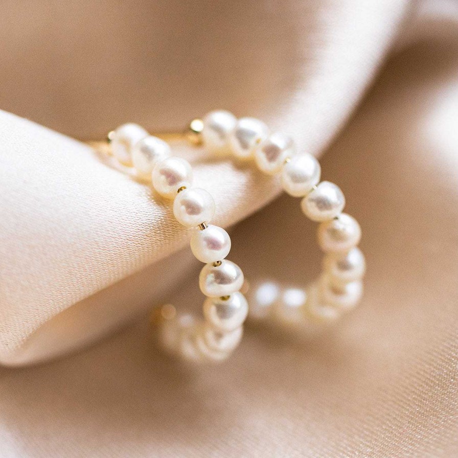 Local Eclectic Solid Gold Simple Pearl Huggie Hoops